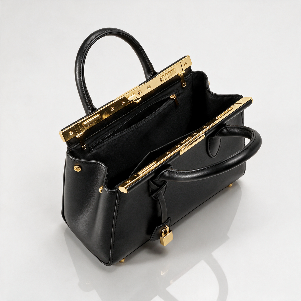 Aubrenne Lock Handbag